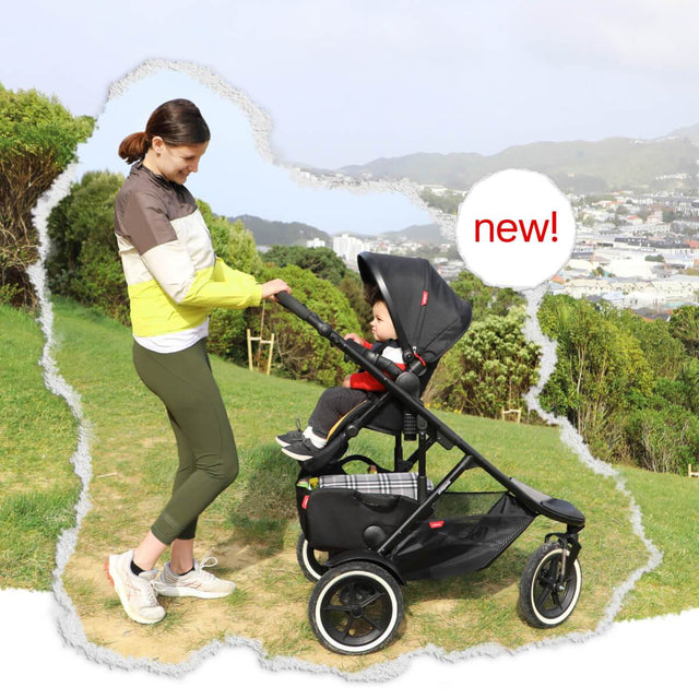 Mother and child out for a walk with child facing their parent in their phil&teds sport verso buggy