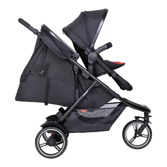 phil&teds dot inline buggy with double kit in front and sling seat in lie flat for newborn